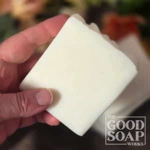 Tallow Soap in hand showing side