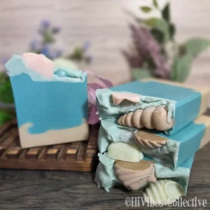 Beach Soap layered tallow soap with beige sand turquoise waves white foam and soap seashells on top unlabeled