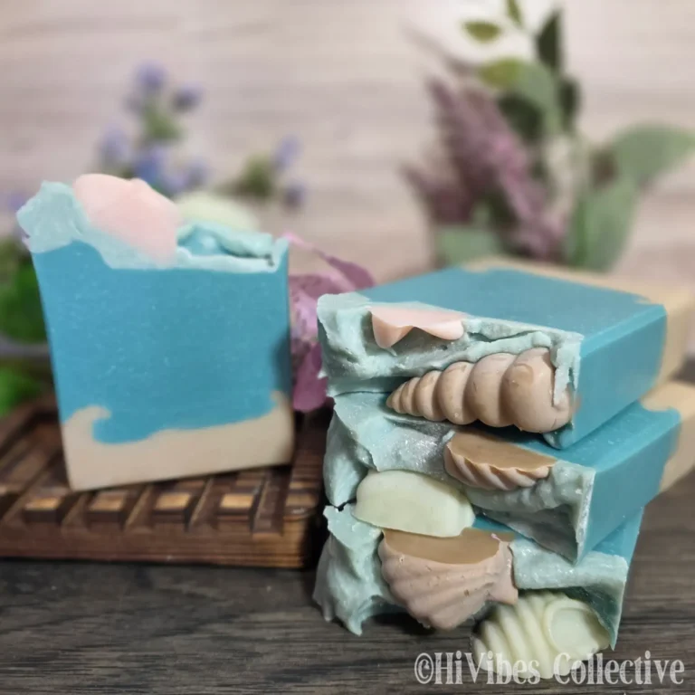 Beach Soap layered tallow soap with beige sand turquoise waves white foam and soap seashells on top unlabeled
