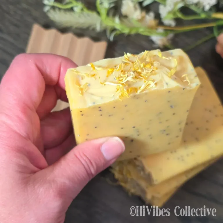 Sunlit Citrus Tallow Soap top view showing dried calendula petals on annatto-infused tallow soap