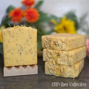 Sunlit Citrus Tallow Soap medium golden yellow 100% tallow soap with calendula petals on soap dish