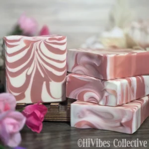 Peppermint Holiday Soap rosy pink and white candy cane swirl handcrafted tallow bar