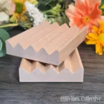 Flat alder wood soap dish with slotted surface to drain water and keep soap dry between uses