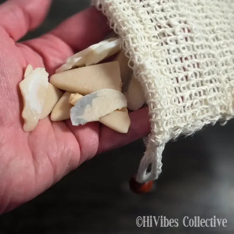 Sisal soap saver bag filled with small leftover soap scraps — a zero-waste way to use every last piece