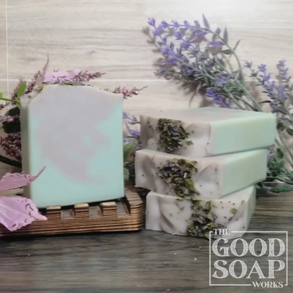 Lavender Mint Soap swirl of lavender and green tallow soap with lavender buds and poppy seeds on top unlabeled
