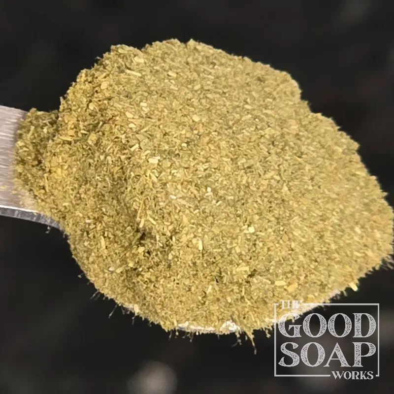 Close-up of Alfalfa powder on a spoon, a botanical ingredient used in soap and skincare by The Good Soap Works Co.