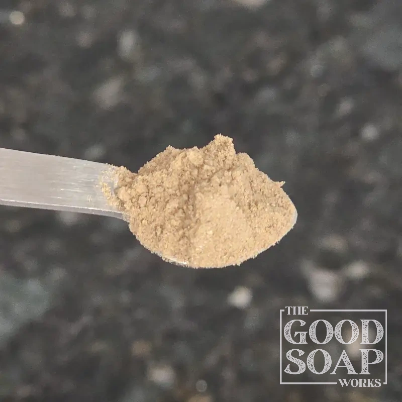 Close-up of Aloe Vera powder on a spoon, a soothing ingredient used in soap and skincare by The Good Soap Works Co.