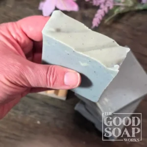 Blue Atlas Soap held showing Top View