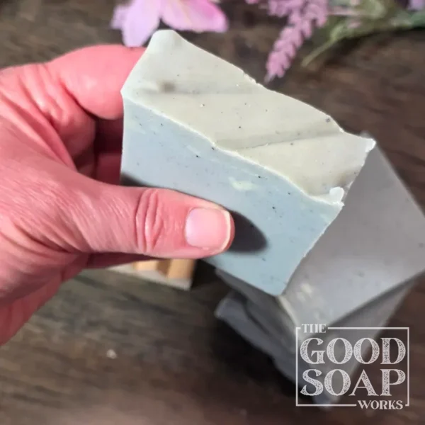 Blue Atlas Soap held showing Top View