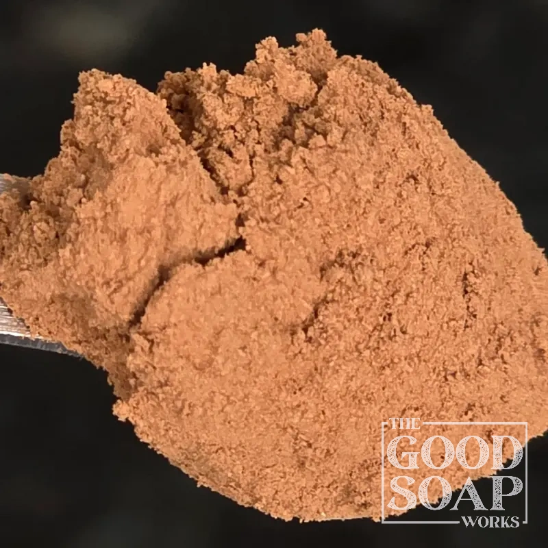 Close-up of Cacao Powder on a spoon, a natural colorant and botanical ingredient used in soap and skincare by The Good Soap Works Co.