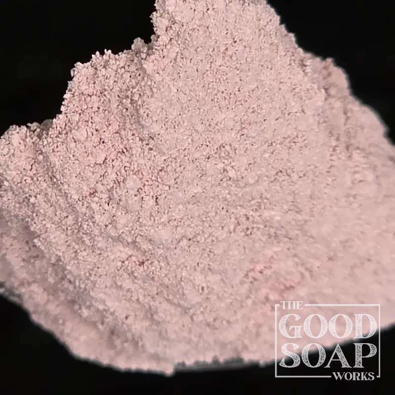Close-up of Calamine powder on a spoon, a soothing ingredient used in soap and skincare by The Good Soap Works Co.