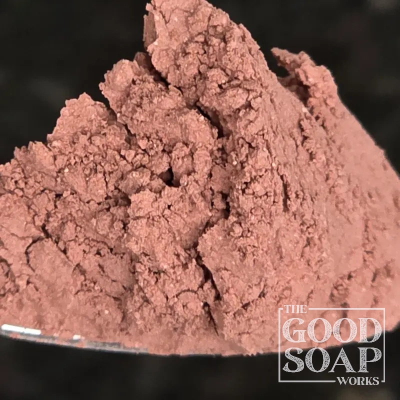 Close-up of French Pink Clay powder on a spoon, a gentle clay ingredient used in soap and skincare by The Good Soap Works Co.