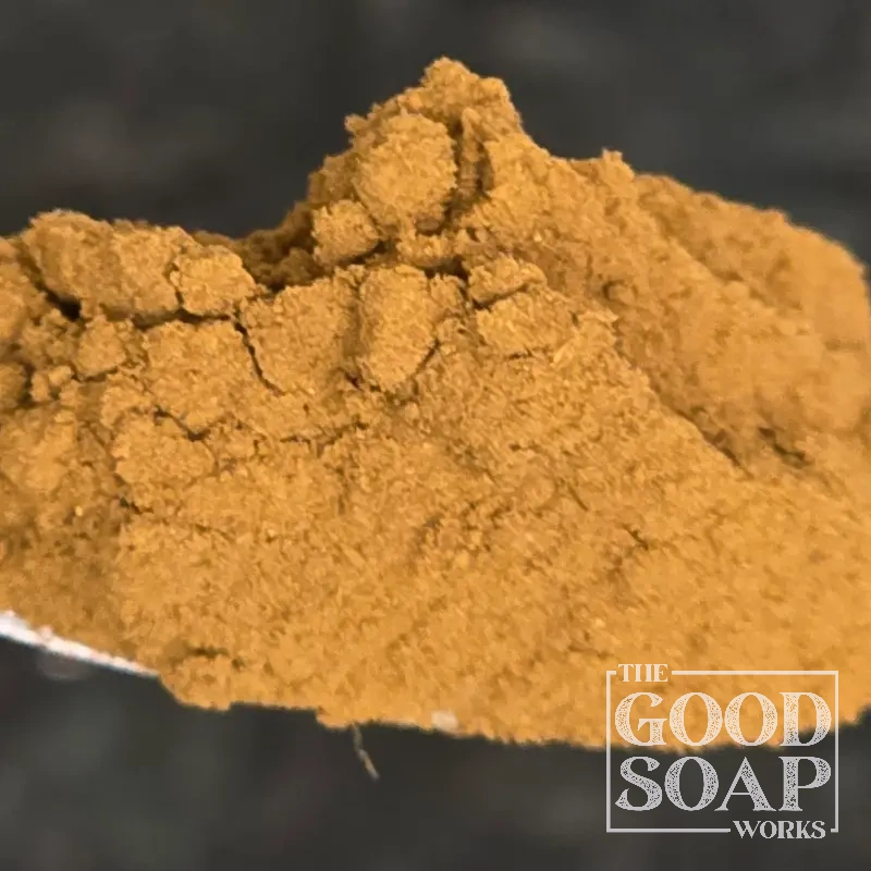 Close-up of Himalayan Rhubarb powder on a spoon, a natural colorant ingredient used in soap by The Good Soap Works Co.