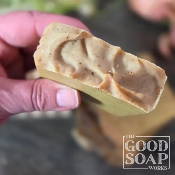 Holiday Woods Tallow Soap top view showing turmeric specks in light brown woodsy cinnamon soap