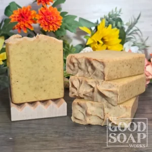Holiday Woods Tallow Soap light golden brown 100% tallow soap with turmeric specks top and side view on dish