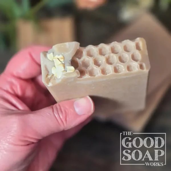 Honeycomb & Oat Soap in hand showing top
