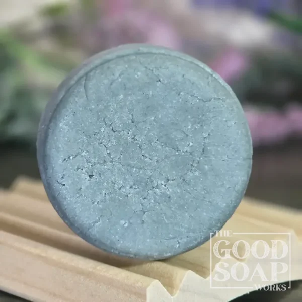 Kokum Cedar Shampoo Bar on Curved Soap Dish