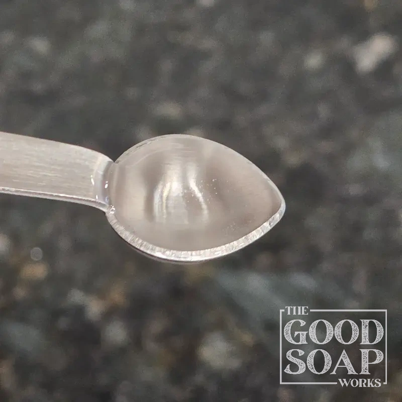 Close-up of Liquid Glycerin on a spoon, a soap and skincare ingredient used by The Good Soap Works Co.