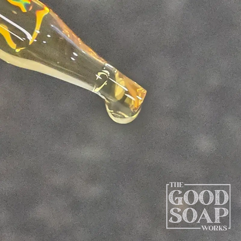 Neem oil in a dropper bottle — a botanical oil used in natural soap making and herbal skincare
