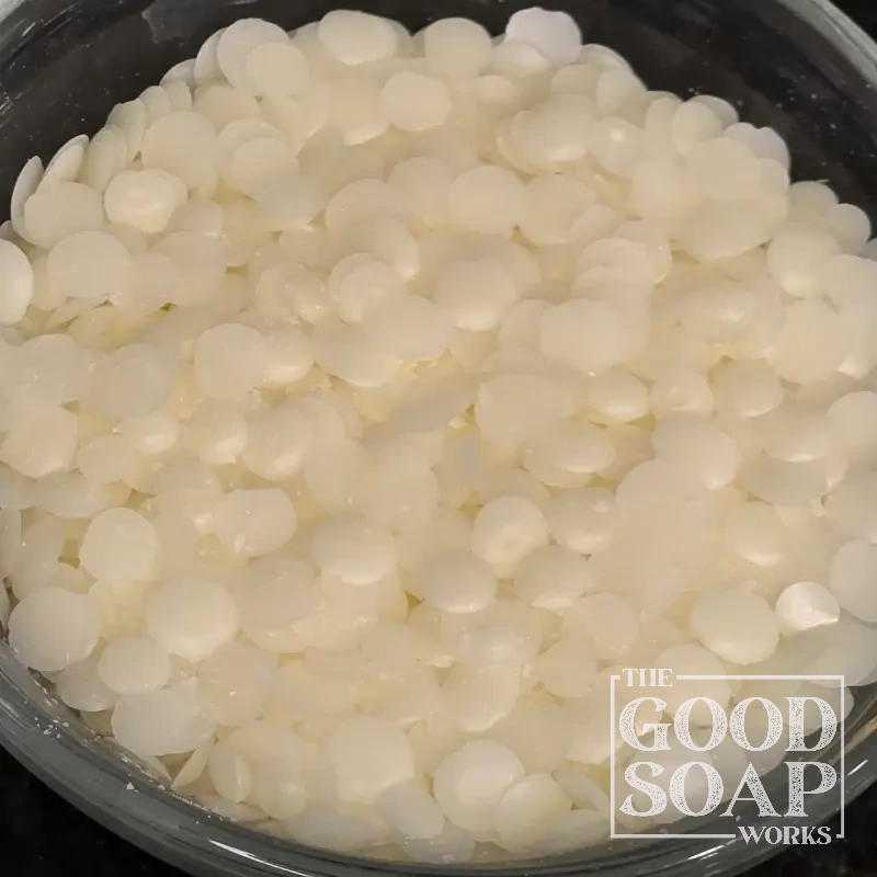 Rice bran wax pellets — a natural plant wax used as a hardener in lip balm, lotion bars, and cosmetics