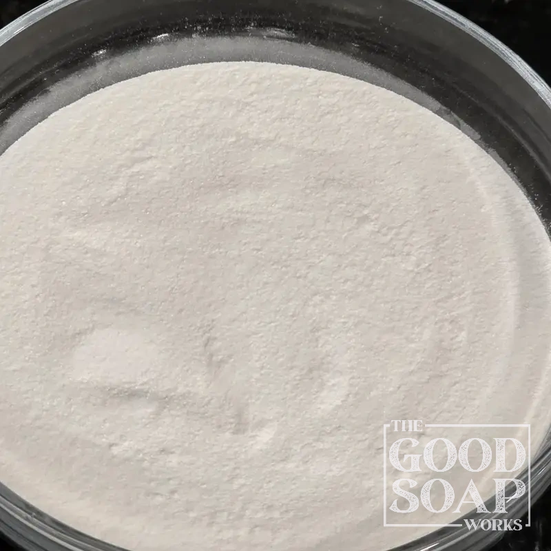 SCI sodium cocoyl isethionate powder in a bowl — a coconut-derived gentle surfactant for shampoo bars