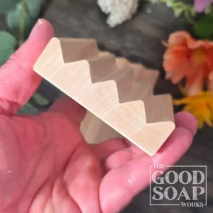 Flat alder wood soap dish being held in had to show size