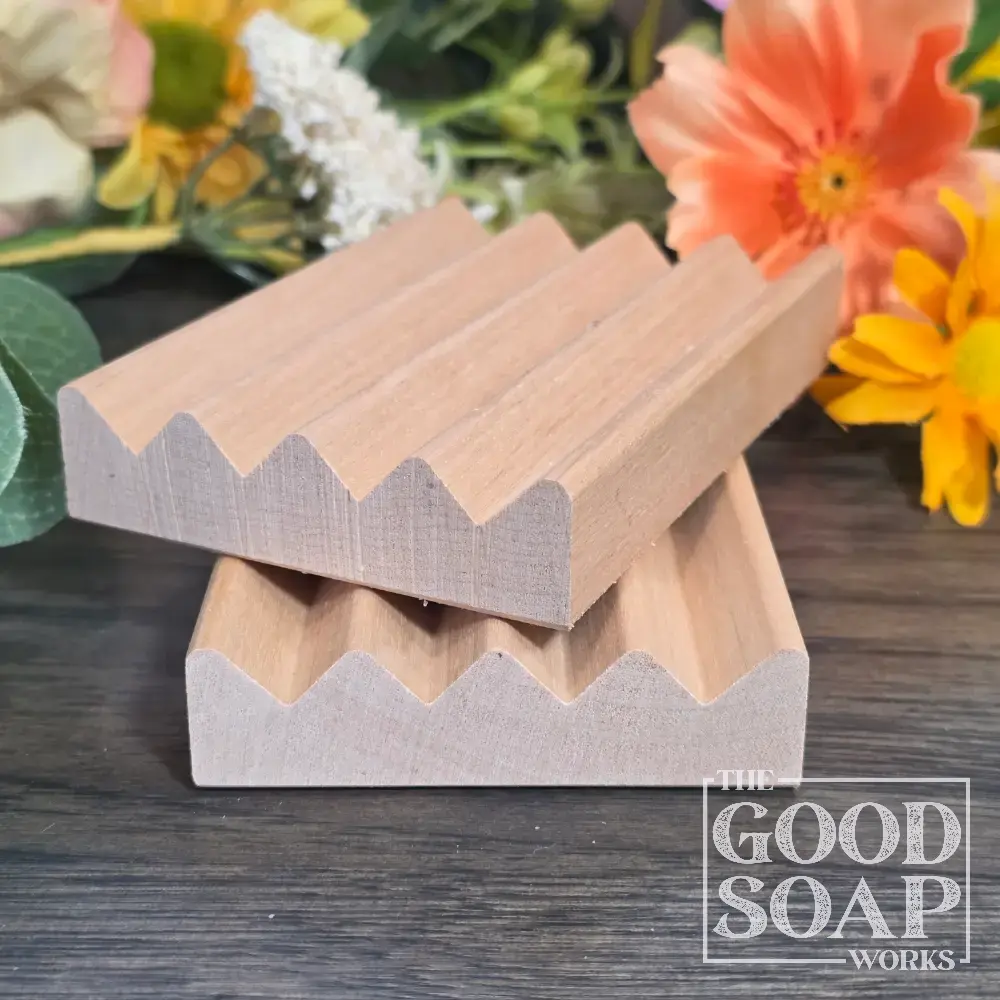 Flat alder wood soap dish with slotted surface to drain water and keep soap dry between uses