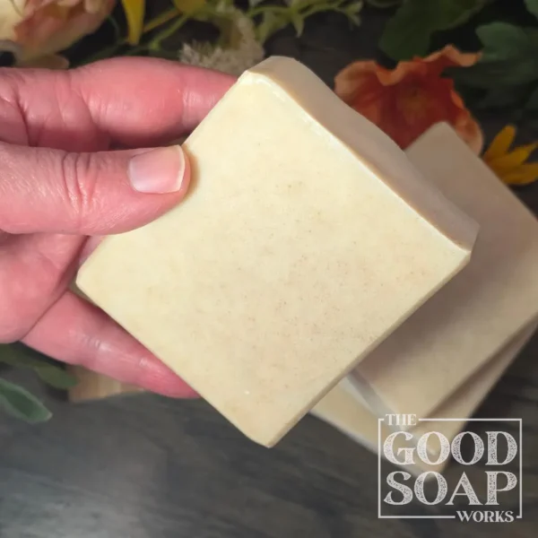 Tallow & Goat Milk Soap in hand showing side