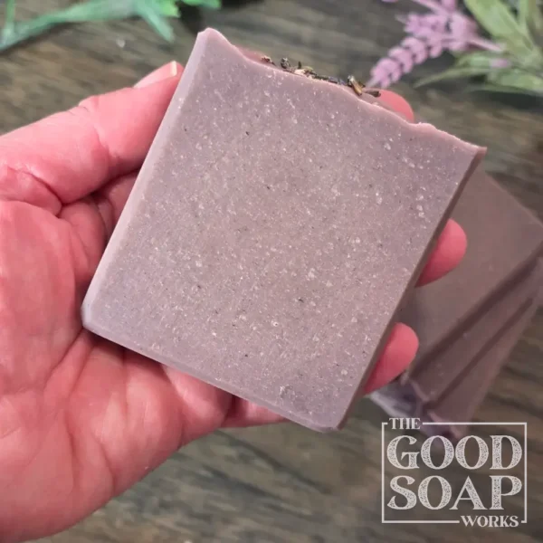 Tallow Soap in hand showing Side