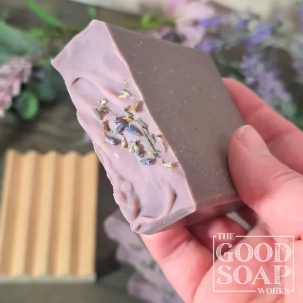 Tallow Soap in hand showing top
