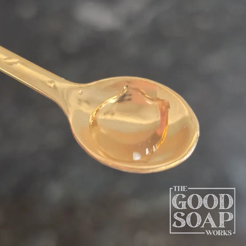 Witch hazel liquid — a botanical astringent used in natural soap making and skincare