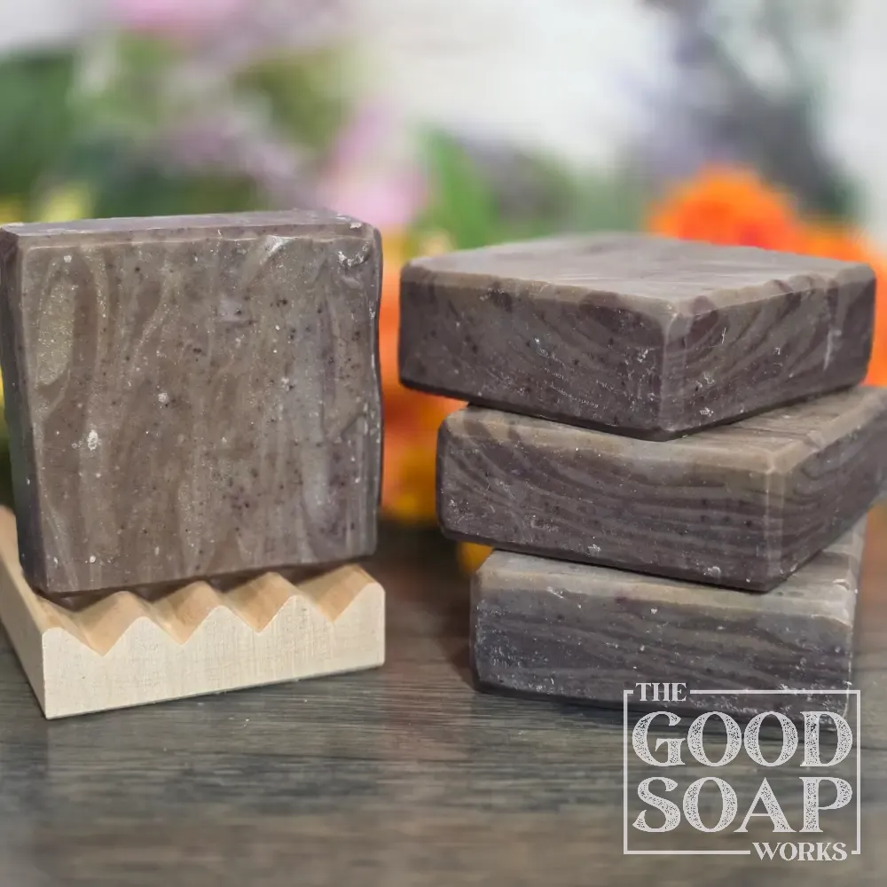 Woodworker's Soap - Wood-Look Design sitting on wood dish showing front and top views