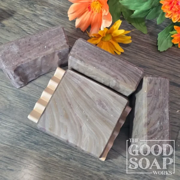 Woodworker's Soap - Wood-Look Design sitting on wood dish showing front and top views